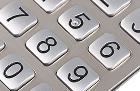 Why Is There a Raised Dot on the "5" Key of Metal Keypads?